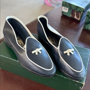 Elegant Black Leather Loafers with White Trim